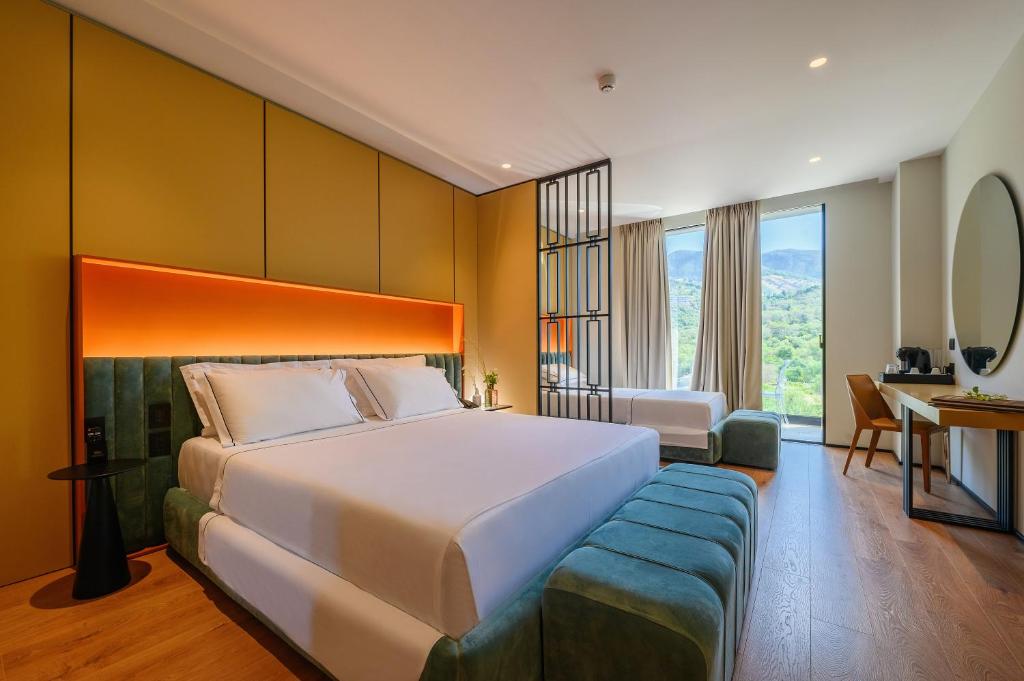 Postel nebo postele na pokoji v ubytování Miamar Luxury Hotel & Spa