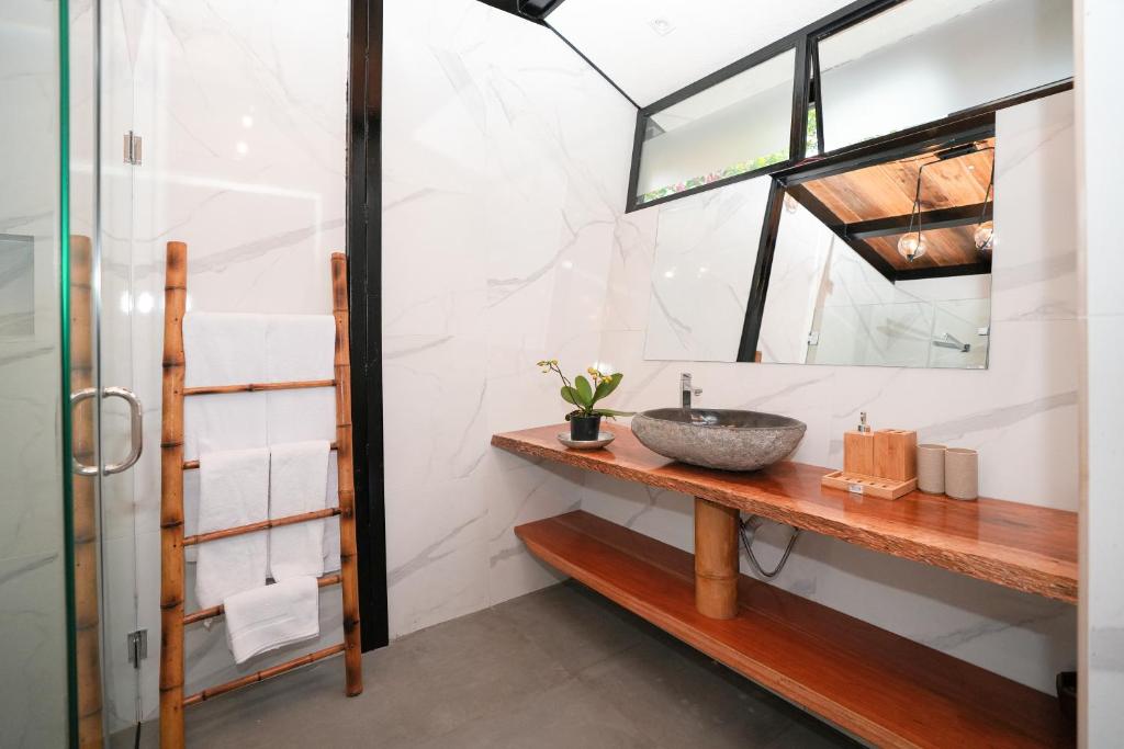 Koupelna v ubytování Suites Casa ColibrÍ