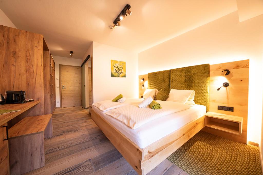 Posteľ alebo postele v izbe v ubytovaní Familienhotel Unterreith