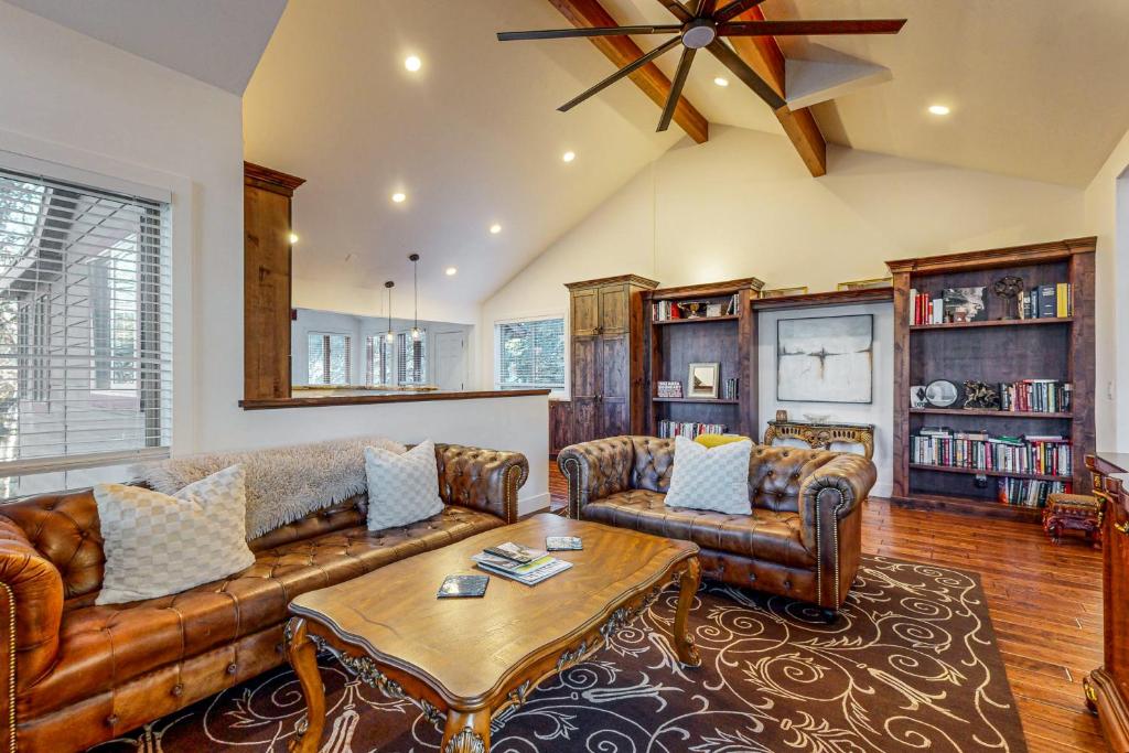 a living room with a couch and a table at Mountain View Retreat - Unit A - Main Home in Park City