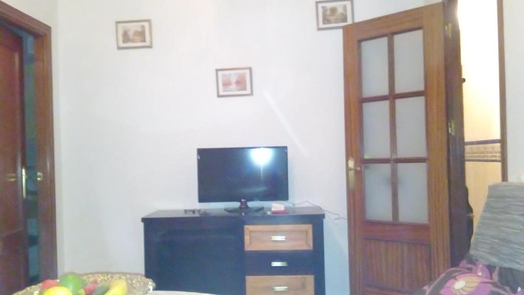 Televízia a/alebo spoločenská miestnosť v ubytovaní Apartamento Rincón del Salvador 2