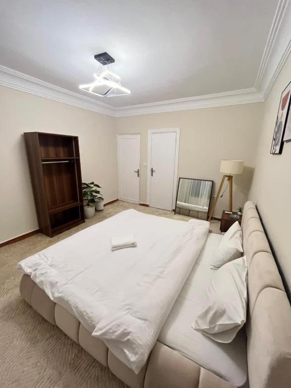 Letto o letti in una camera di Zamalek Taha Hussein open view