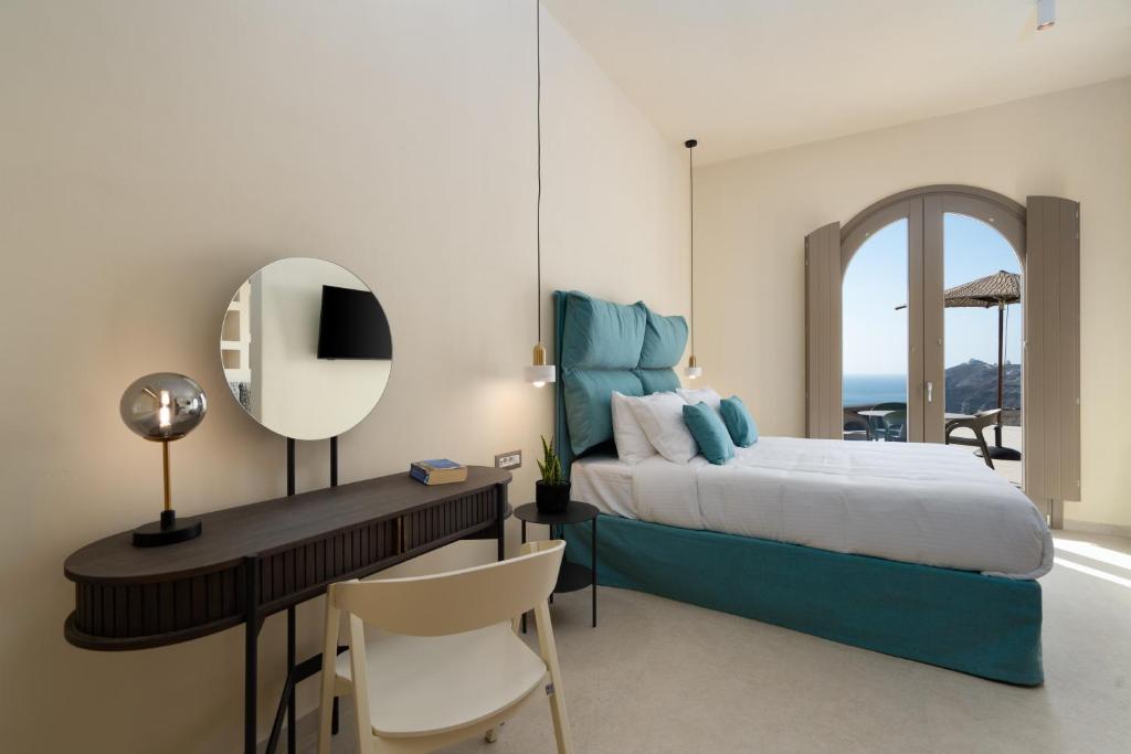 Postel nebo postele na pokoji v ubytování Bay View Residences Santorini