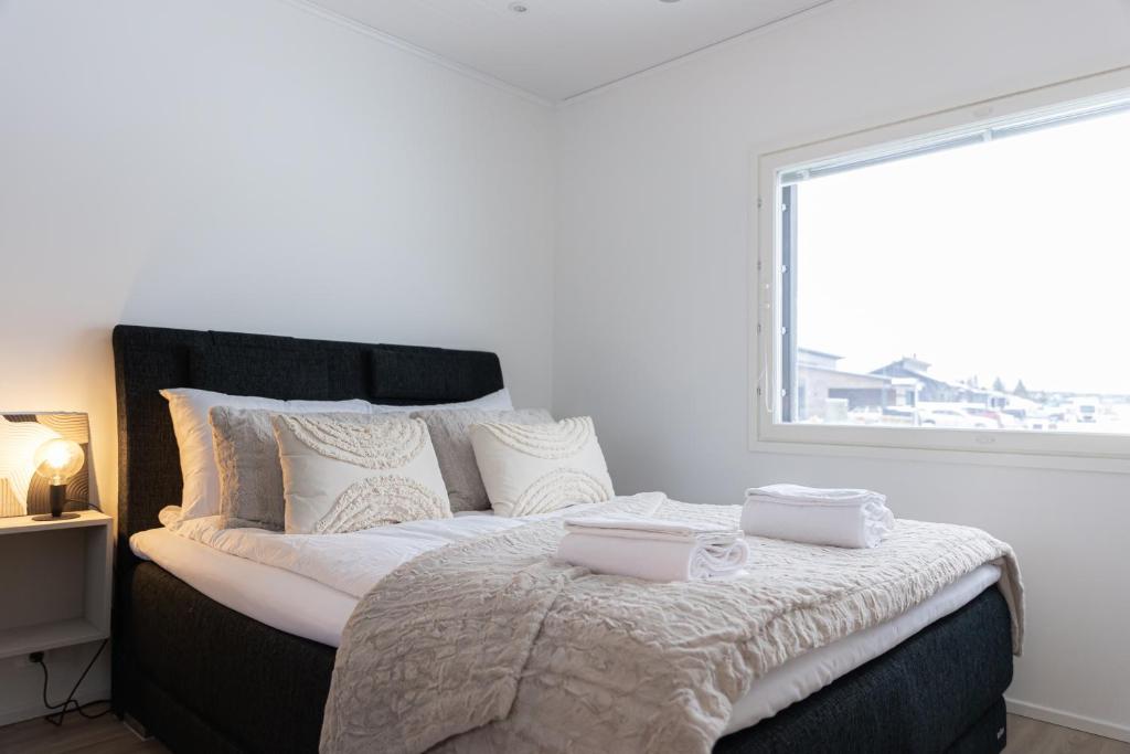 Postel nebo postele na pokoji v ubytování Snow Heaven Suites