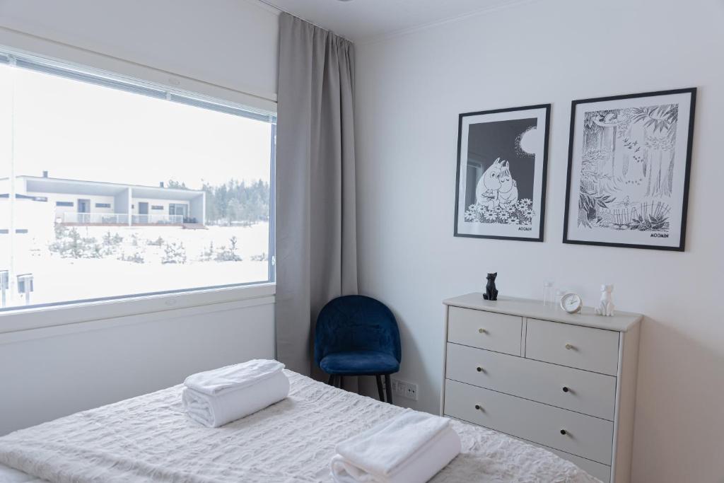 Postel nebo postele na pokoji v ubytování Snow Heaven Suites