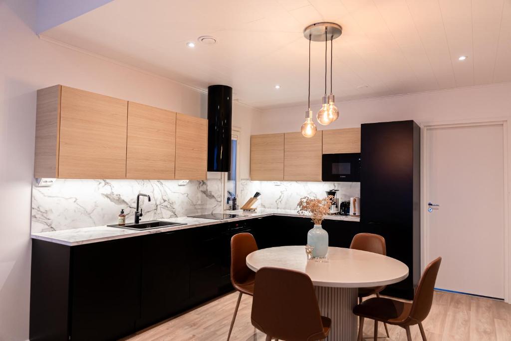 Kuchyň nebo kuchyňský kout v ubytování Snow Heaven Suites