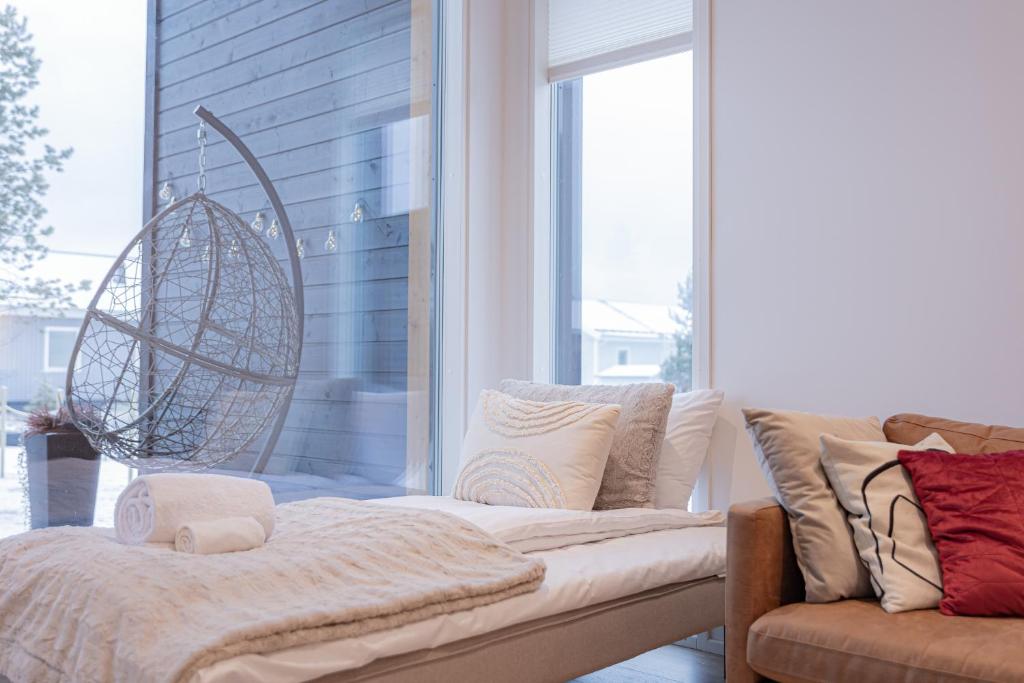 Postel nebo postele na pokoji v ubytování Snow Heaven Suites