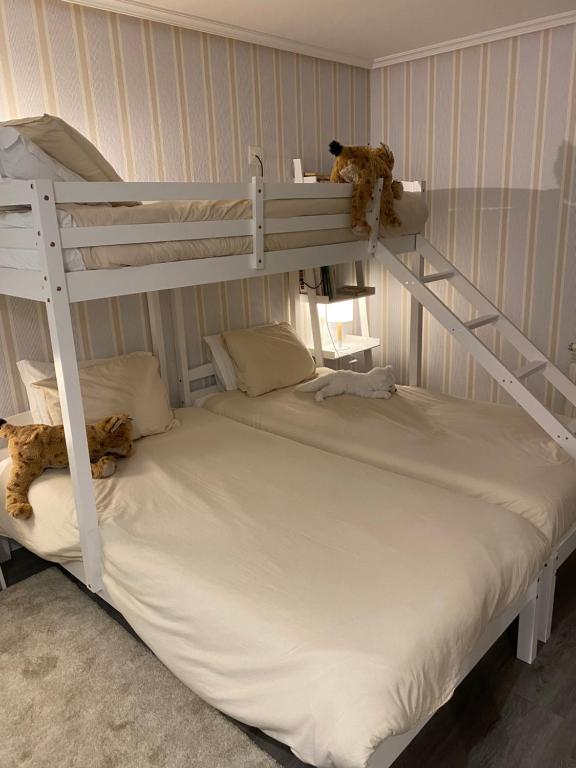 Uma cama ou camas num quarto em Hotel Lusitano