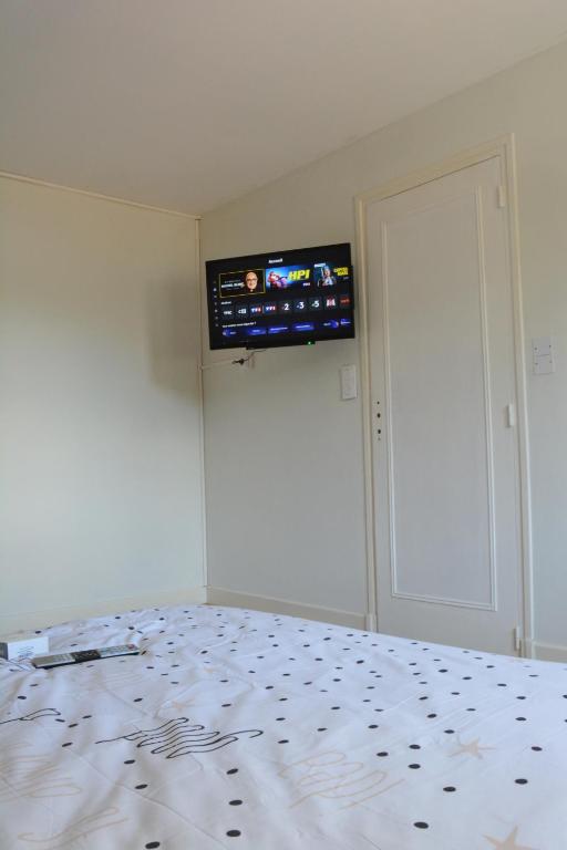 TV a/nebo společenská místnost v ubytování Appartement modulable