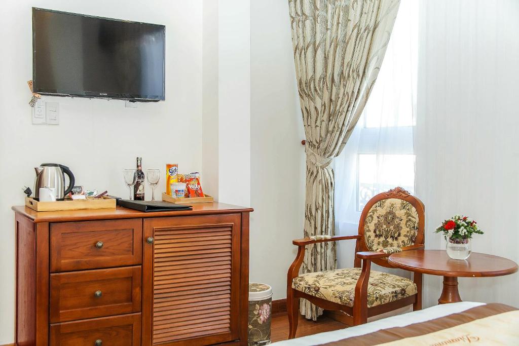 TV a/nebo společenská místnost v ubytování Diamond Hotel