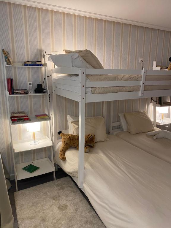 Uma cama ou camas num quarto em Hotel Lusitano