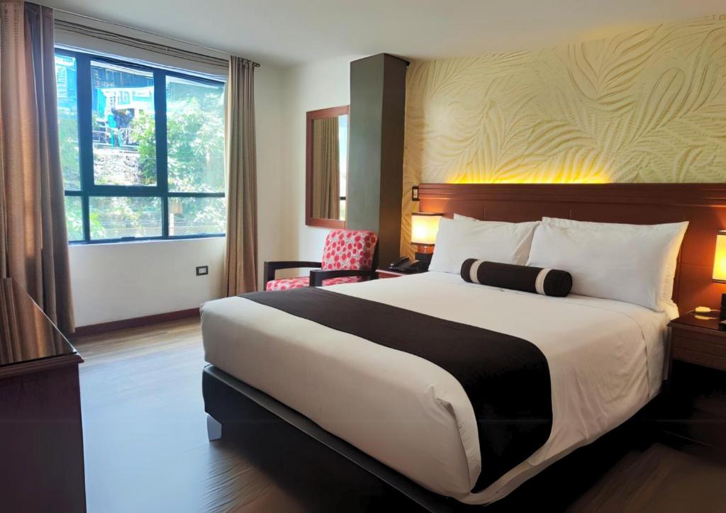 Voodi või voodid majutusasutuse Hotel Ferré Machu Picchu toas