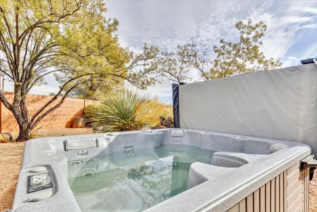 a hot tub on the balcony of a house at Private Hot Tub Pets Allowed Park Close By in Ivins