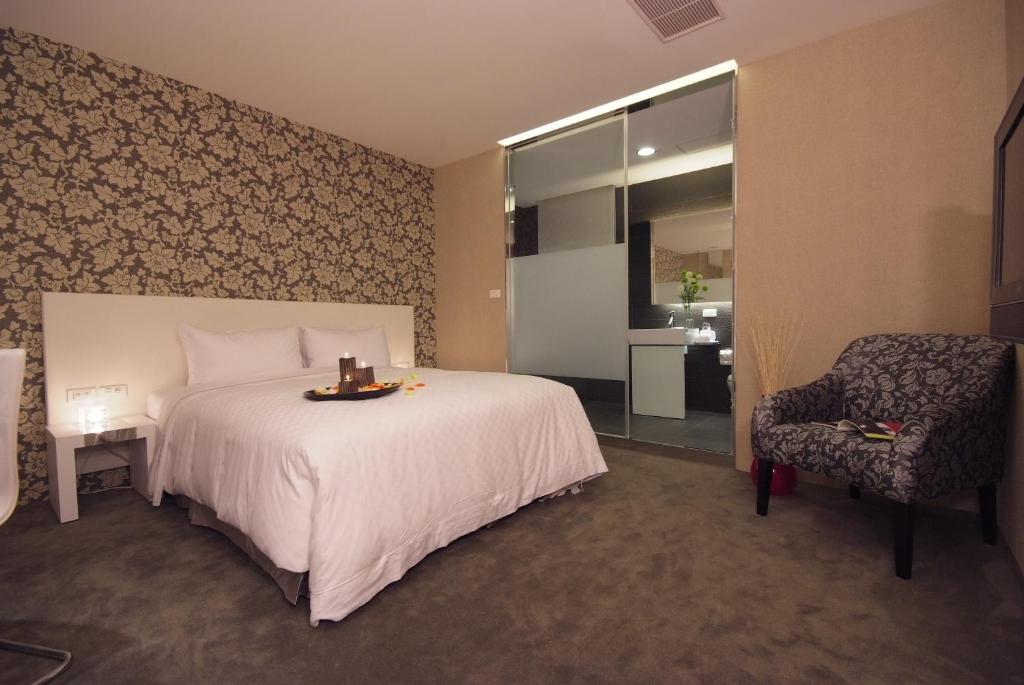 Postel nebo postele na pokoji v ubytování Hotel Purity