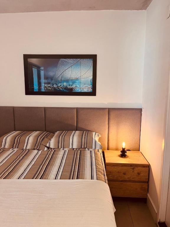 Postel nebo postele na pokoji v ubytování Studio Moderno no Centro - Check-in Digital e Wi-Fi Rápido