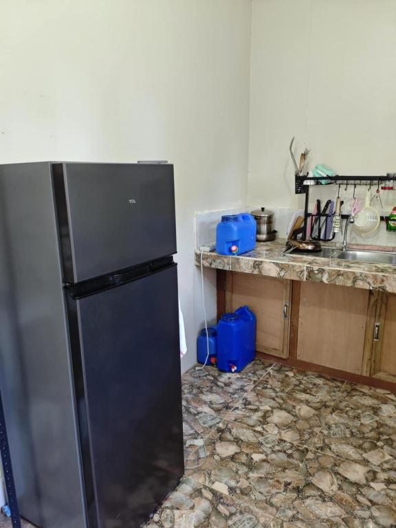 Kuchyň nebo kuchyňský kout v ubytování Buhay Probinsya - Bubolongan