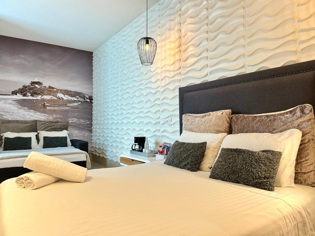 Postel nebo postele na pokoji v ubytování Bonita Bay Concept Hotel by Xarm Hotels