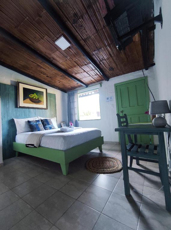 Postel nebo postele na pokoji v ubytování Finca San Alejandro