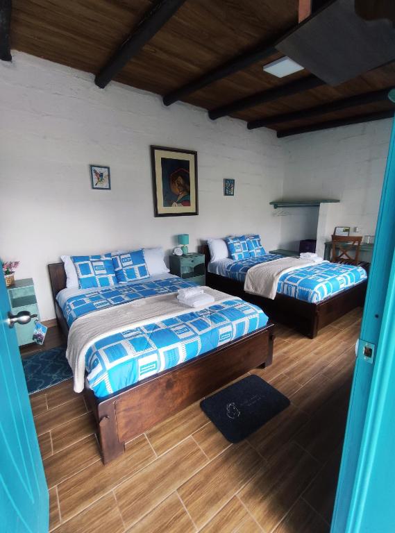 Postel nebo postele na pokoji v ubytování Finca San Alejandro