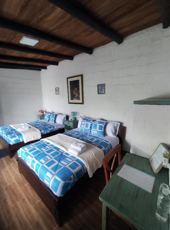 Postel nebo postele na pokoji v ubytování Finca San Alejandro
