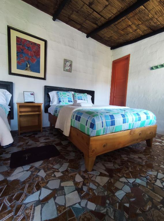 Postel nebo postele na pokoji v ubytování Finca San Alejandro
