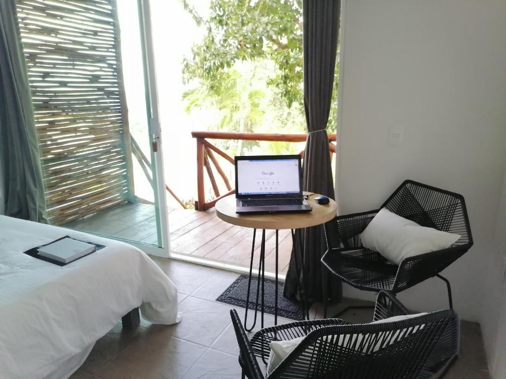 Posezení v ubytování Hotel Xurús Bacalar
