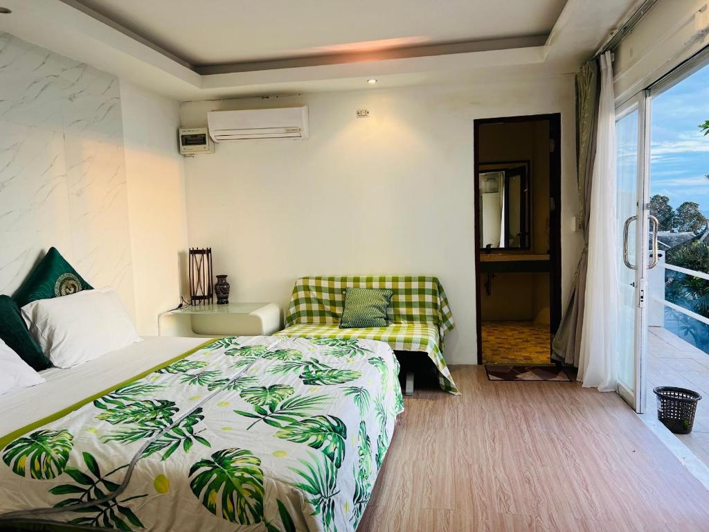 Ένα ή περισσότερα κρεβάτια σε δωμάτιο στο studio sunset