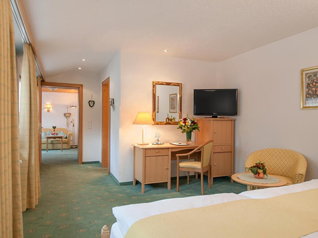 Postel nebo postele na pokoji v ubytování Kaisers Tanne - Premium Alles Inklusive Hotel