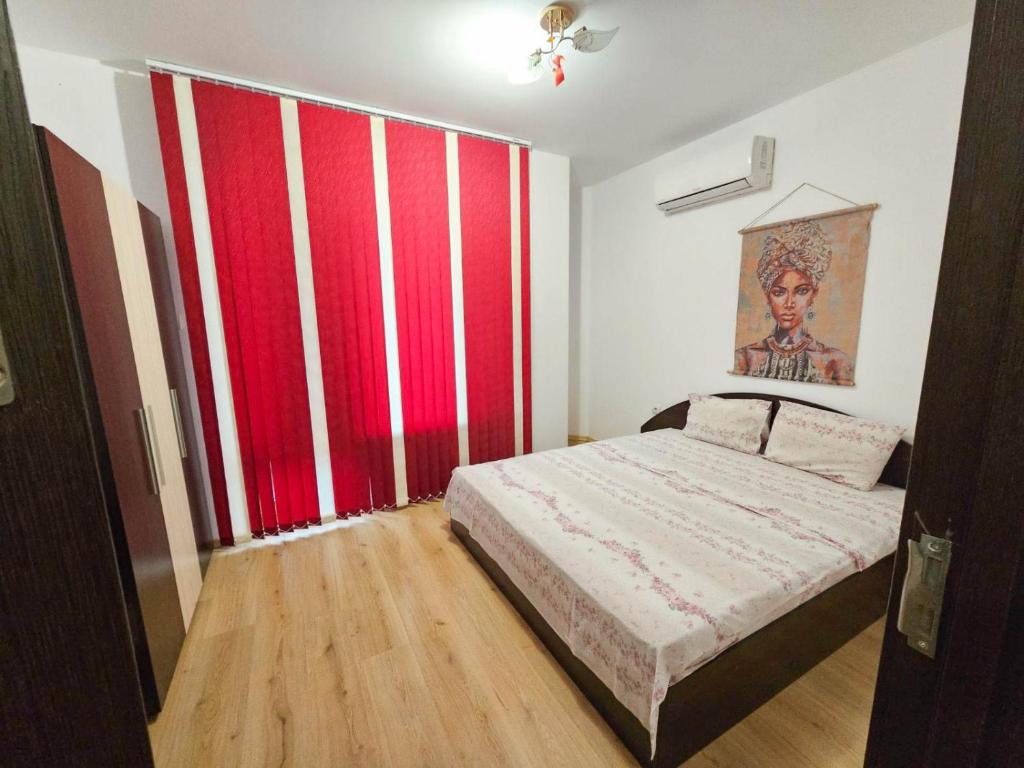 Postel nebo postele na pokoji v ubytování Central Apartment