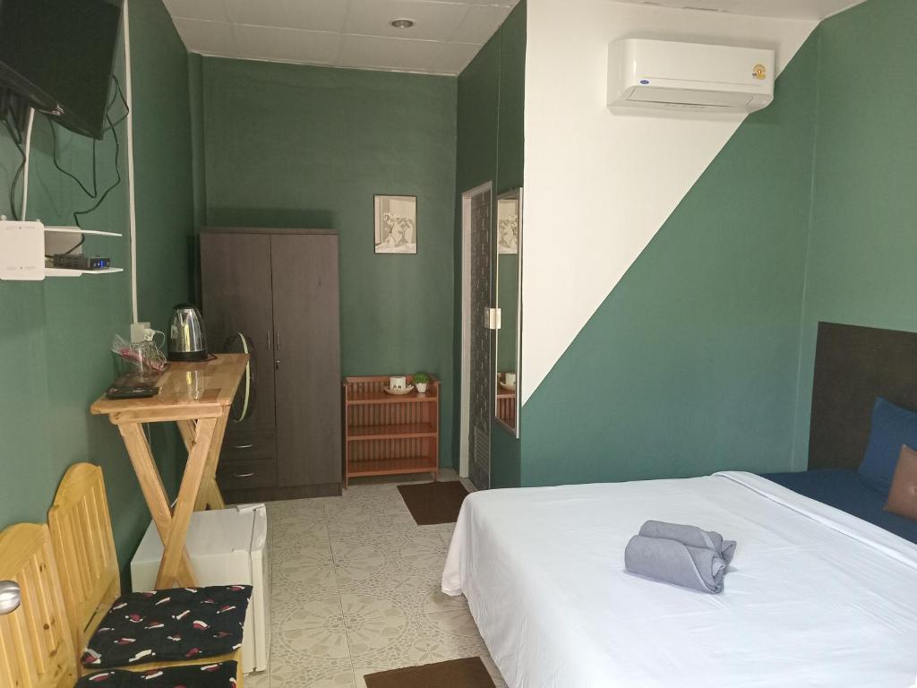 Postel nebo postele na pokoji v ubytování life style bungalow