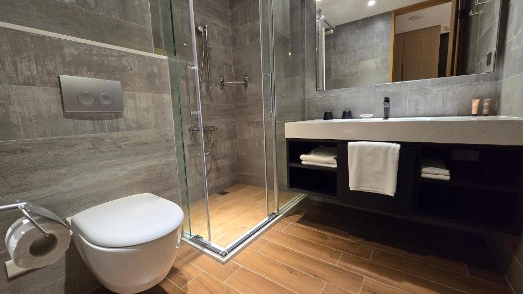 Koupelna v ubytování Hotel R14