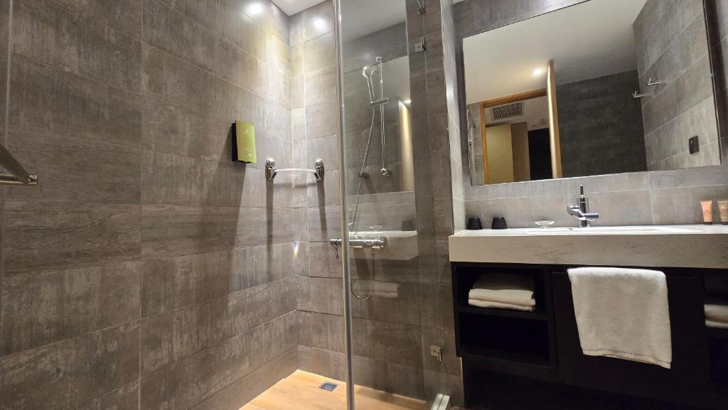 Koupelna v ubytování Hotel R14