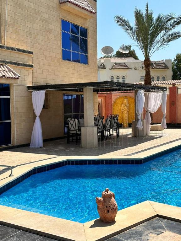 Bazén v ubytování Private villa in Hurghada nebo v jeho okolí
