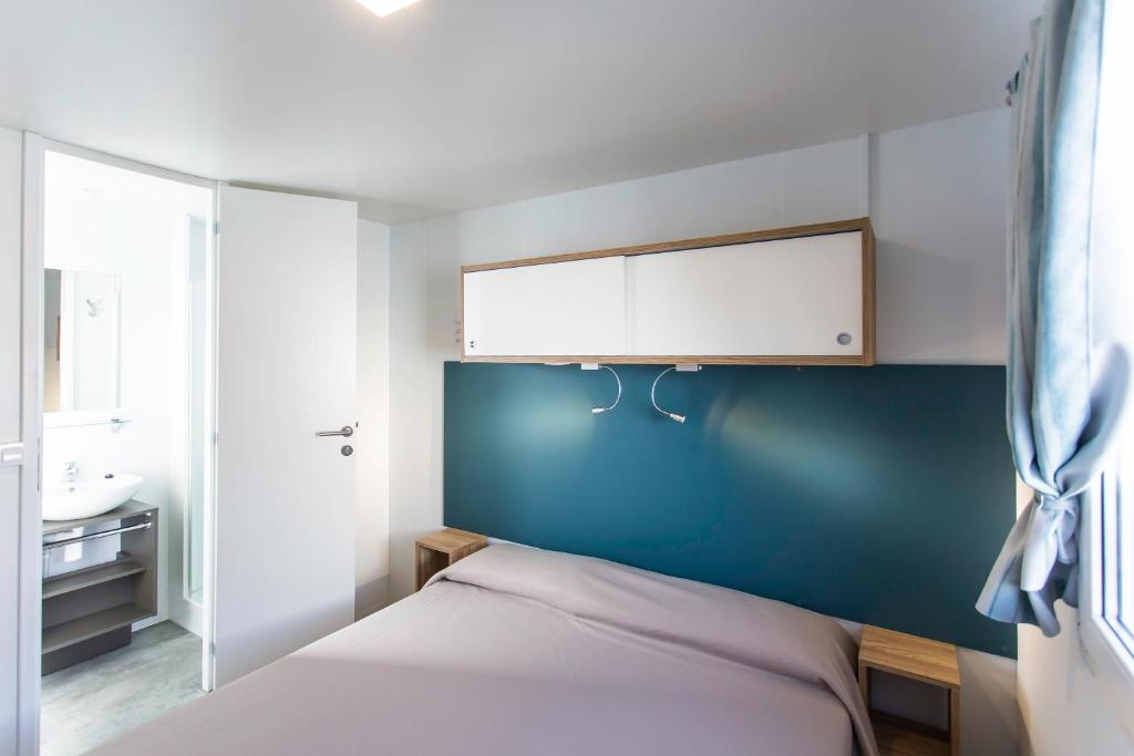 Letto o letti in una camera di Camping Marelago