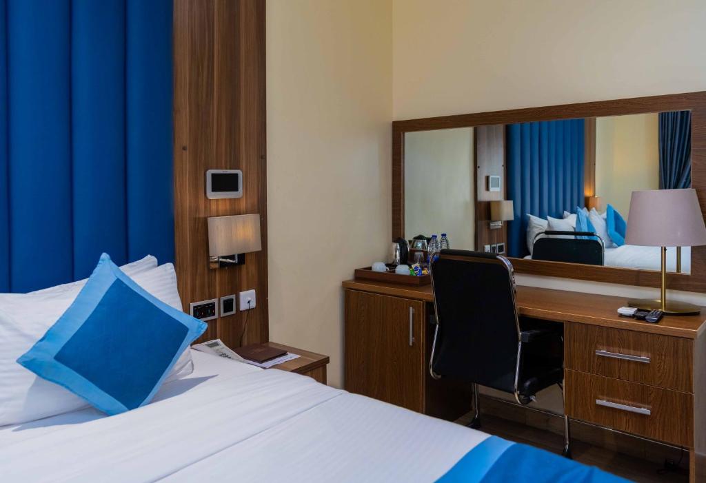 Postel nebo postele na pokoji v ubytování Watercress Hotels and Event
