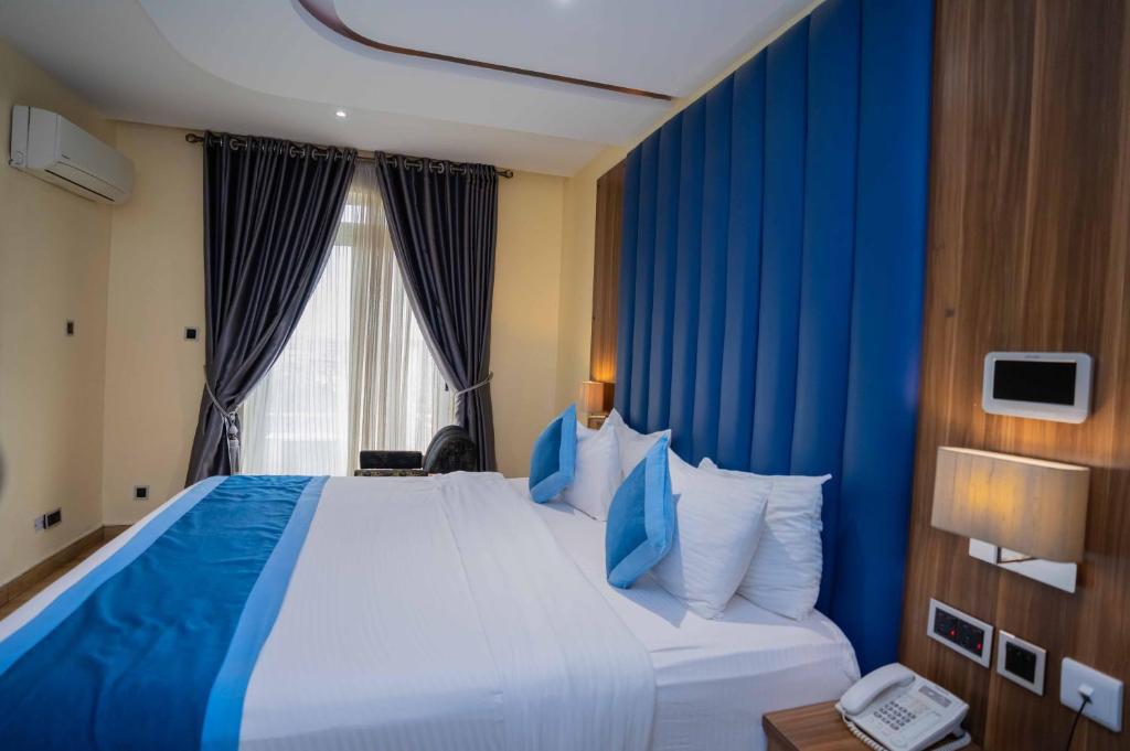 Postel nebo postele na pokoji v ubytování Watercress Hotels and Event