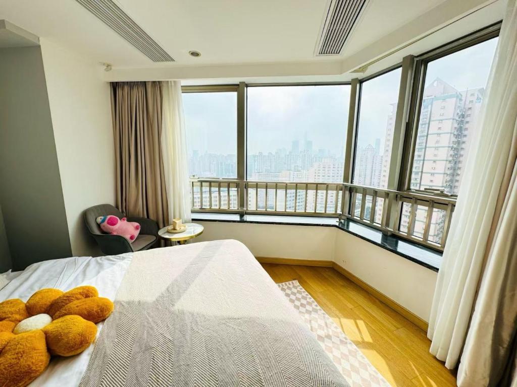 Shanghai Lerongju Boutique Shanghai Apartment - Deluxe Suite Mit Kingsize-Bett