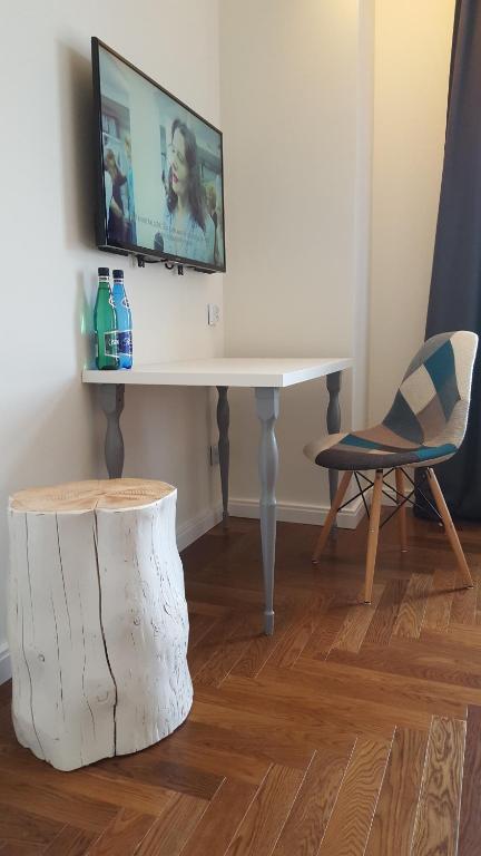 Televízia a/alebo spoločenská miestnosť v ubytovaní NOVUMHOUSE - Tomasza
