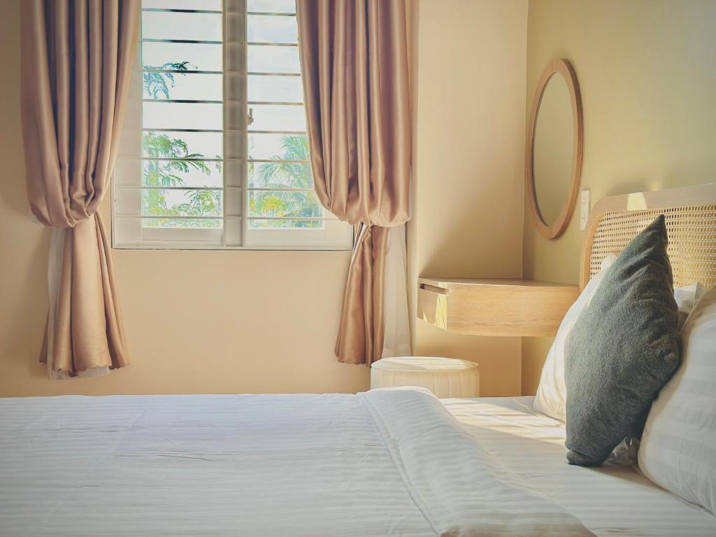 Giường trong phòng chung tại Gia An Hung Guest House