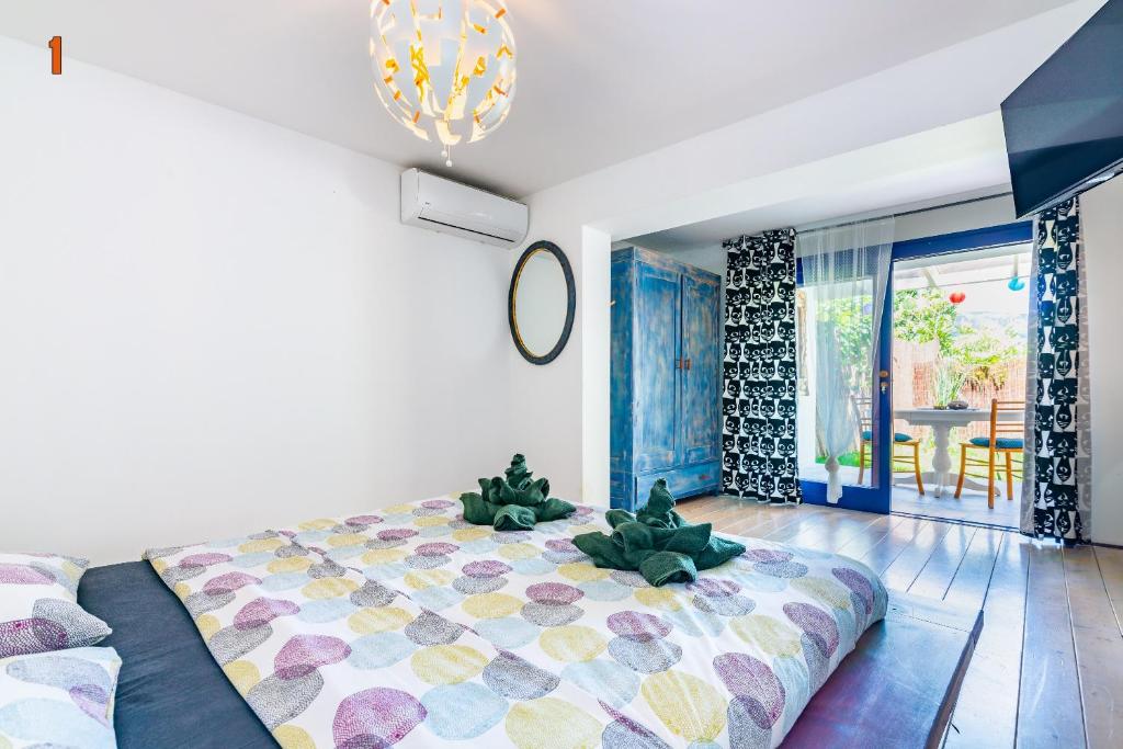 Posteľ alebo postele v izbe v ubytovaní Apartments Dreamland
