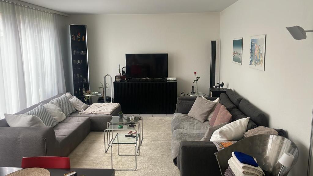 Posezení v ubytování Zimmer mit privatem Badezimmer in guter Lage
