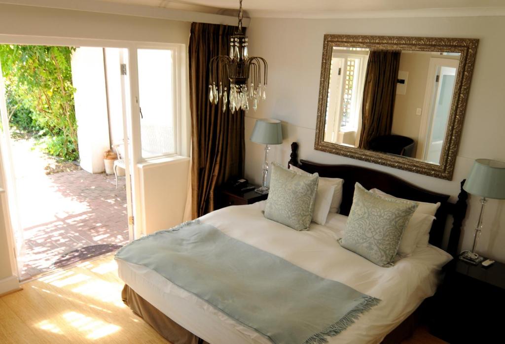Krevet ili kreveti u jedinici u objektu Abbey Manor Luxury Guesthouse