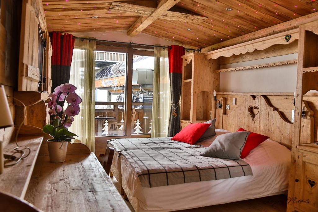 Postel nebo postele na pokoji v ubytování Hotel L'Equipe