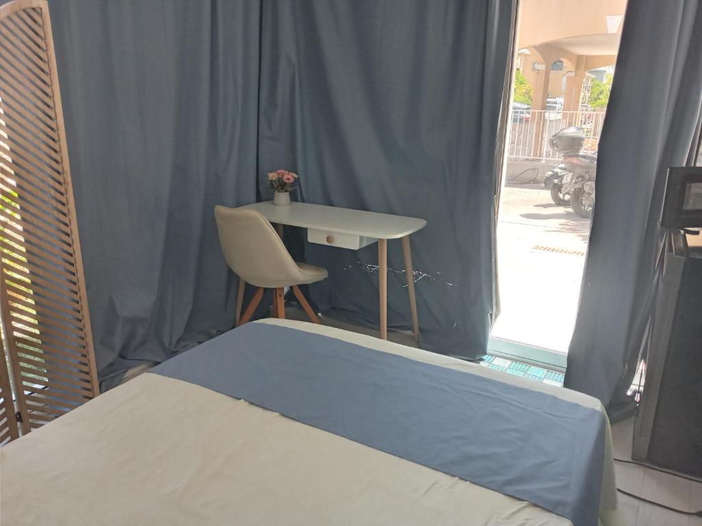Postel nebo postele na pokoji v ubytování Petit coin de paradis