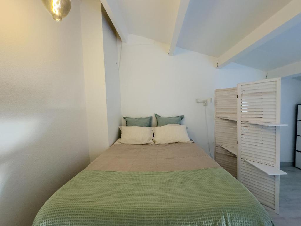 Postel nebo postele na pokoji v ubytování Appartement Le Vauban - 40m2 à Frontignan Plage - À 200m de la Plage - 15 min de Sète
