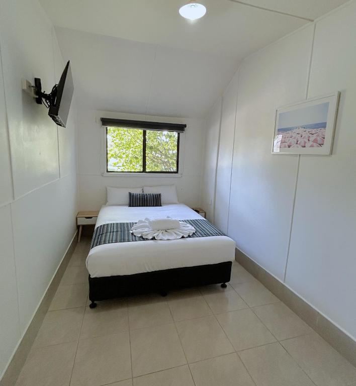 Postel nebo postele na pokoji v ubytování Mandurah Coastal Holiday Park