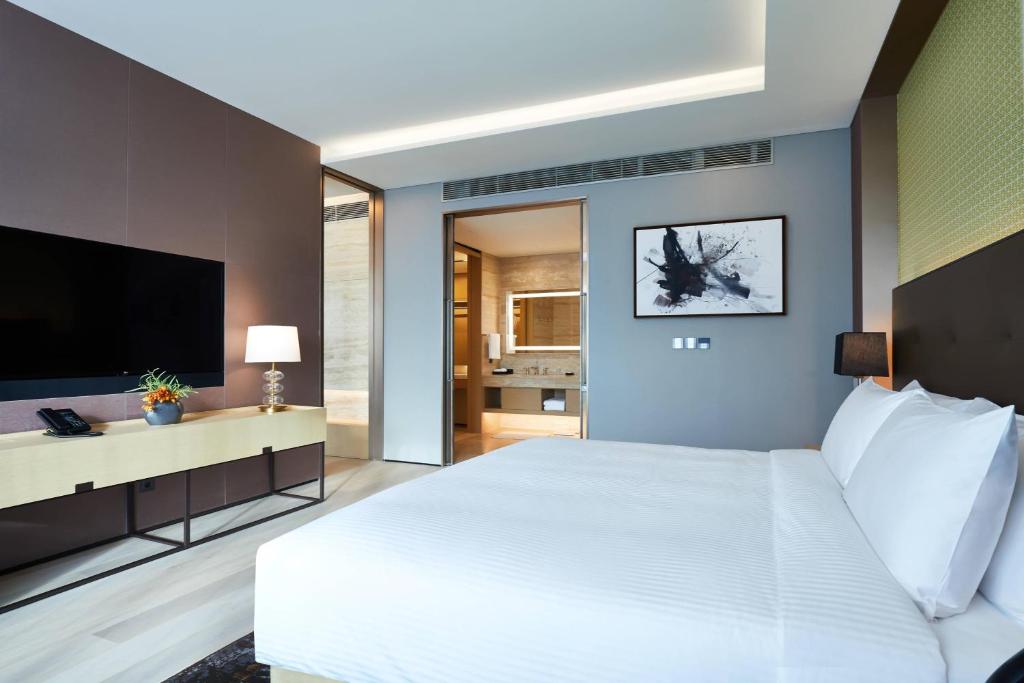 TV a/nebo společenská místnost v ubytování Marriott Jeju Shinhwa World Hotel