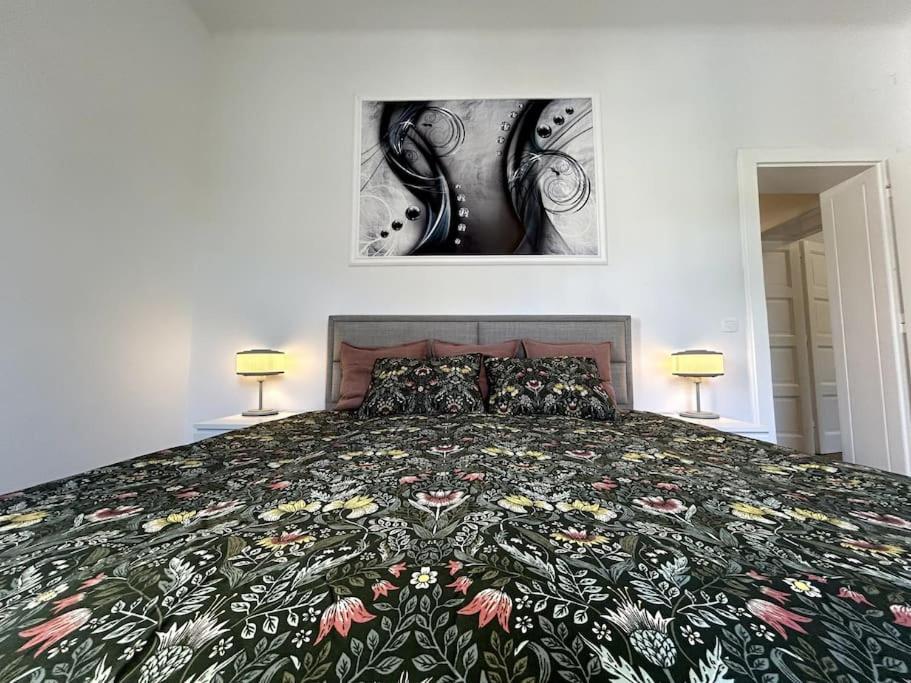 Katil atau katil-katil dalam bilik di Luxury Apartment Privoz