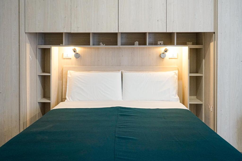 Postel nebo postele na pokoji v ubytování Riol Home