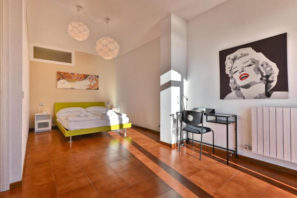 Posteľ alebo postele v izbe v ubytovaní Appartamento Armonia - Theater Home